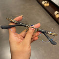 Chrome Hearts frameless round punched retro glasses